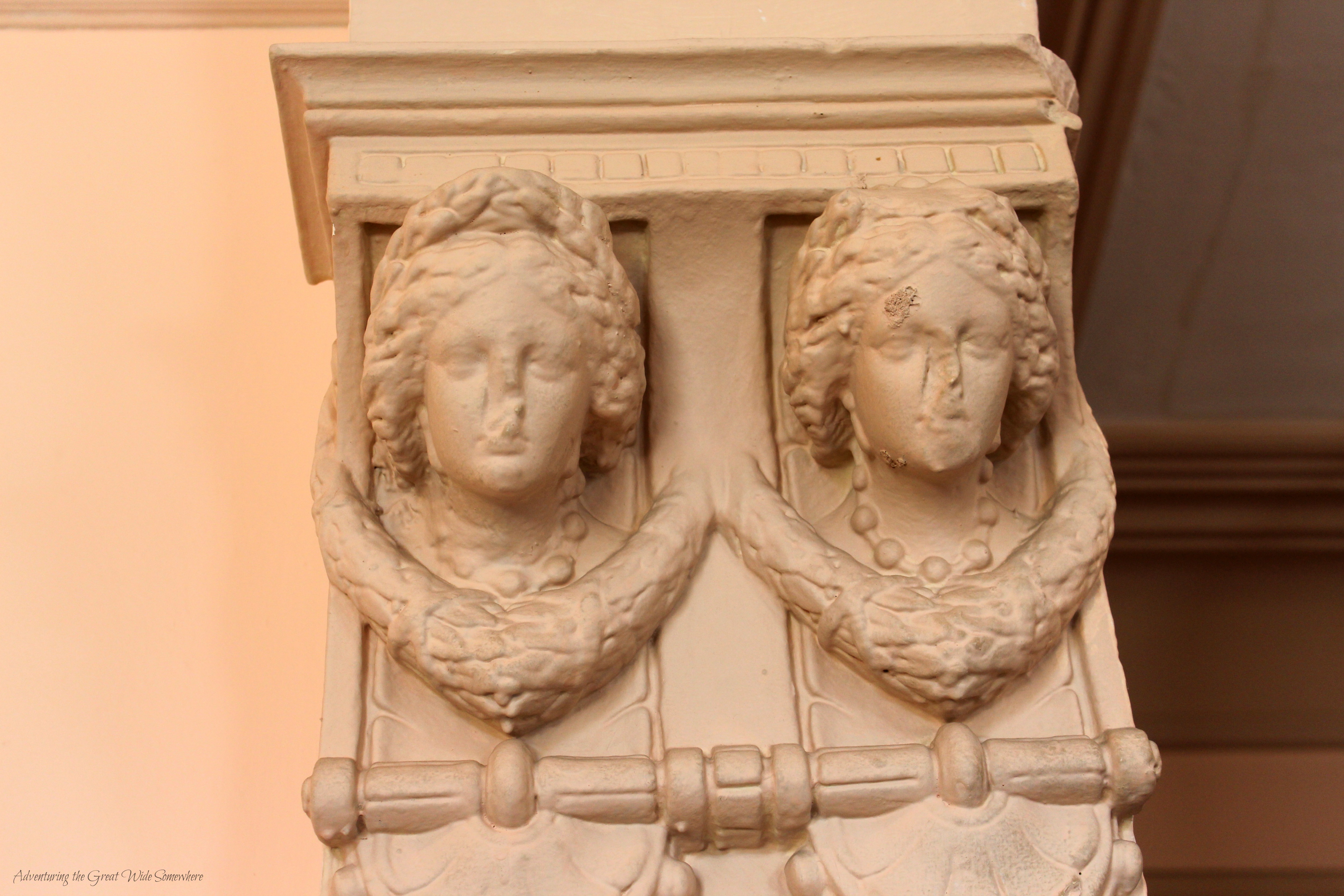 The Sculpted Faces of Angels Decorate a Column in Craigdarroch Castle